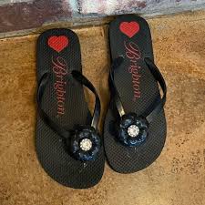 Flores Black Flip Flops size 6
