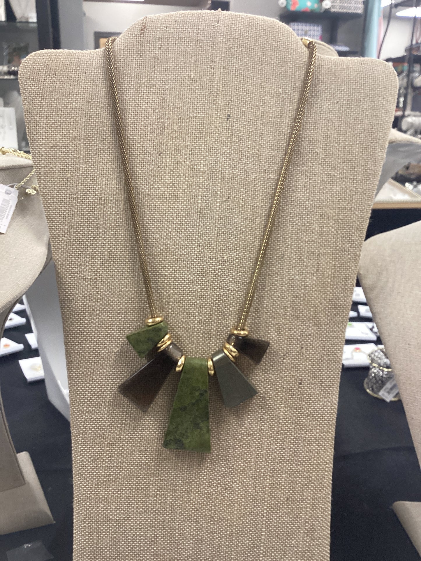 Rhodes statement necklace olive.