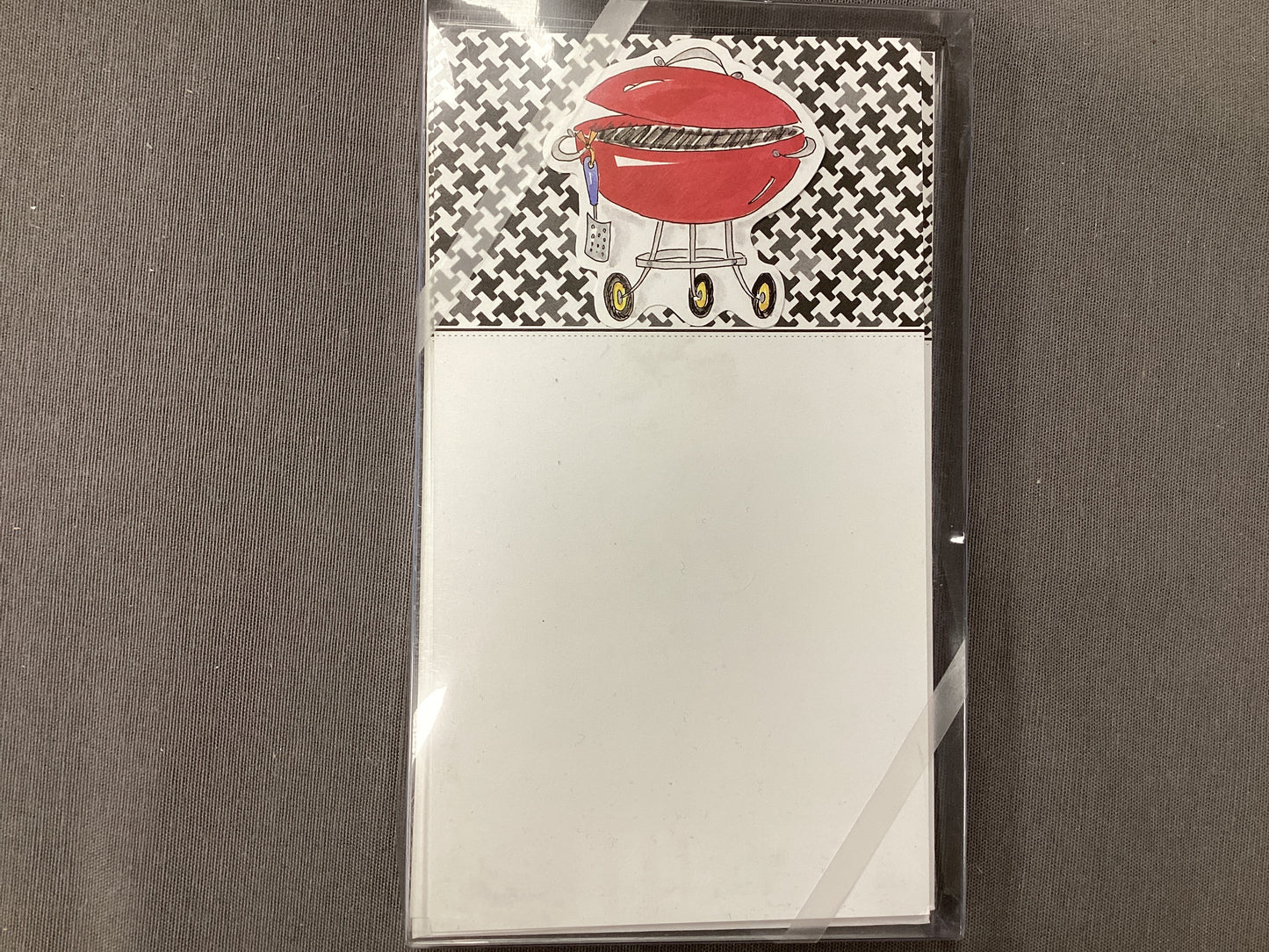 charcoal grill on black houndsto