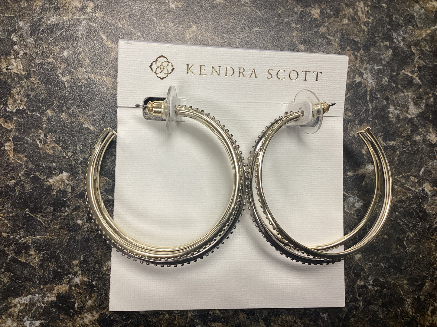 Dana mixed metal hoop earrings.