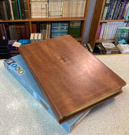 Bible NIV Thin line Bible Large Print Red Letter Brown with cross front Lay Flat