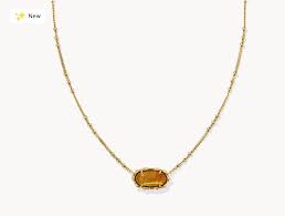 Elisa gold bamboo framed amber illusion necklace