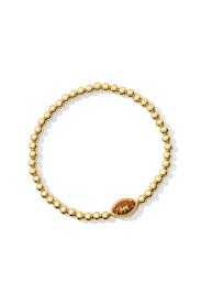 Football goldstone gold beaded stretch bracelet