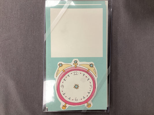 glittered clock on turquoise